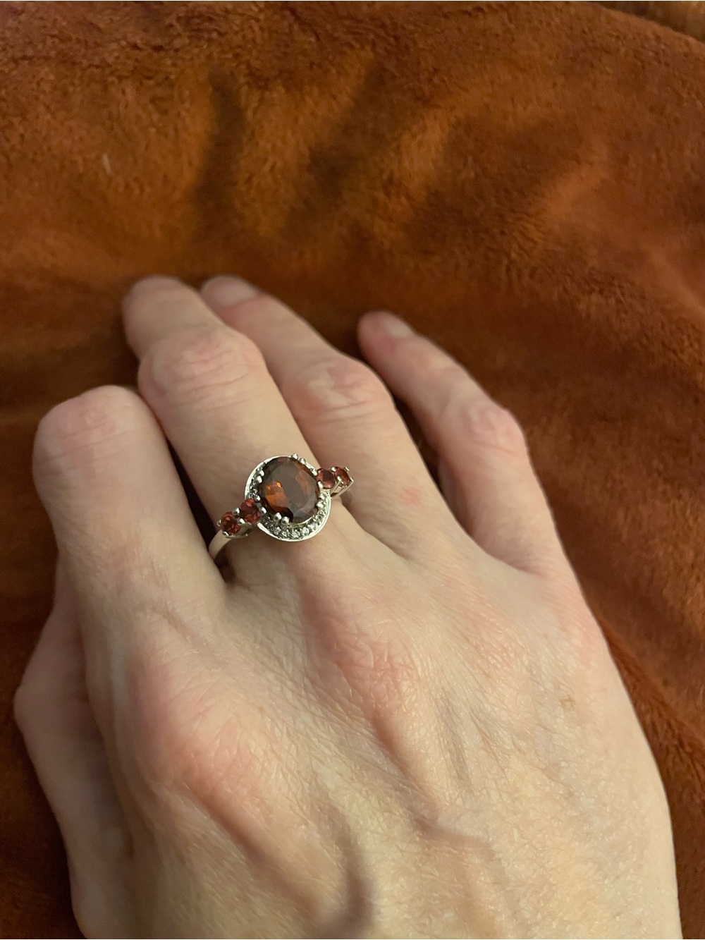 Vintage Oval Garnet Ring with CZ Halo Flanked with 2 Round Garnets Size 8